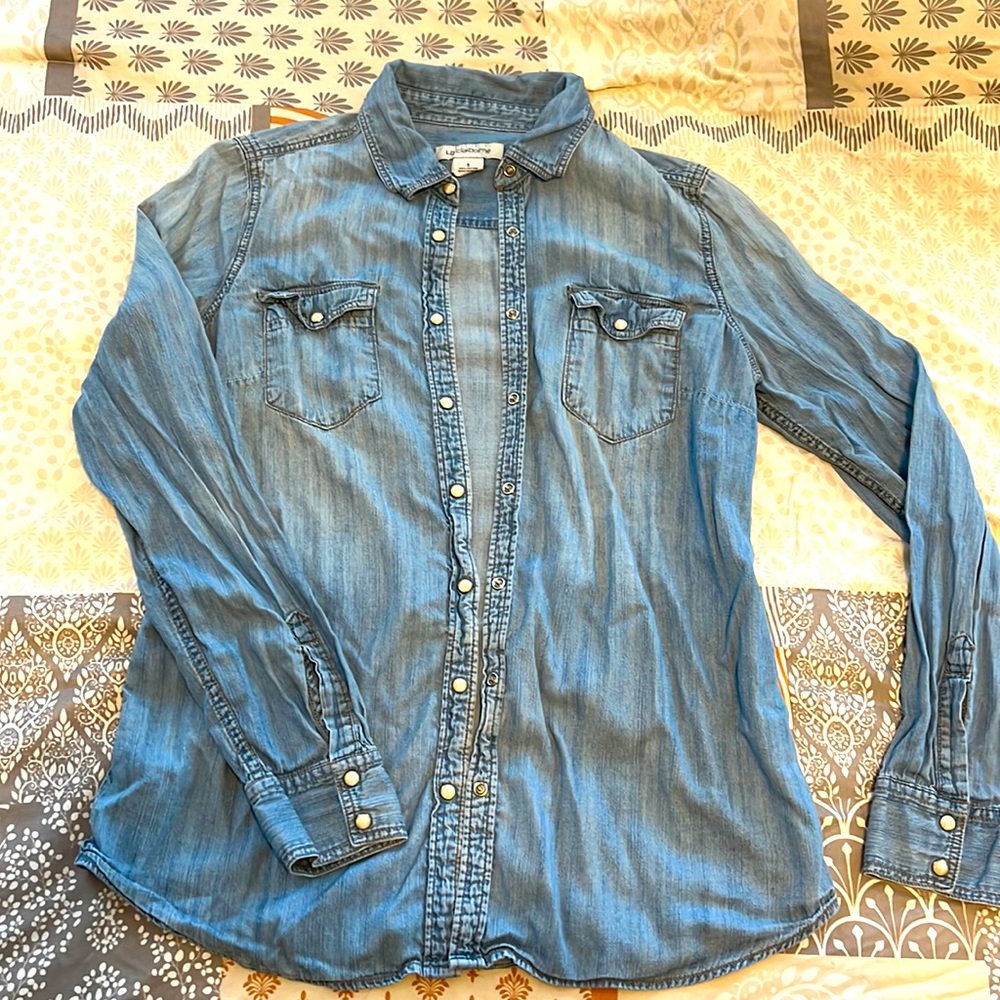 I have a LIZ Claiborne size small blue Jean pearl snap shirt!!